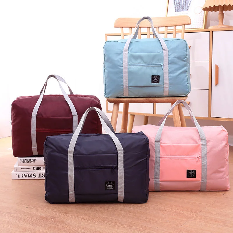 Simple yet chic canvas tote bags with monochrome color schemes for minimalist lovers -Foldable Travel Duffel Bag Women Home Sort Out Quilt Blanket Bag