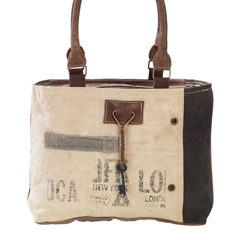 Fashionable tote bags with chain or leather straps for a luxurious design touch -JFK Key Small Tote