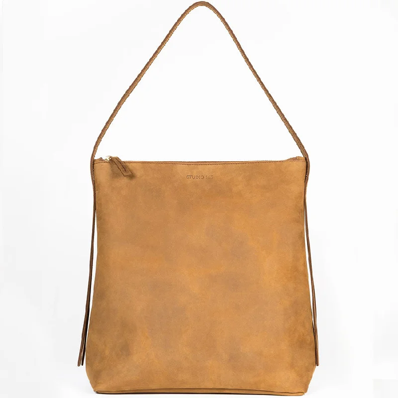 Elegant designer tote bags with luxury materials for fashion-forward individuals -LEATHER SHOPPER "JOKA" IN COGNAC