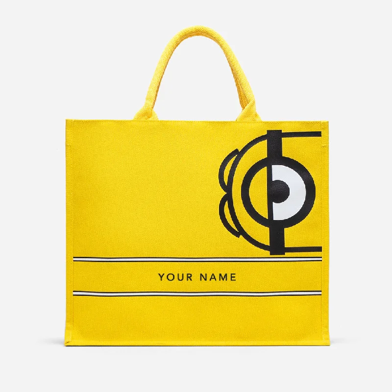 High-fashion leather tote bags with smooth textures and gold hardware for sophistication -Christy Ng x Minion Eye Grocery Bag Big