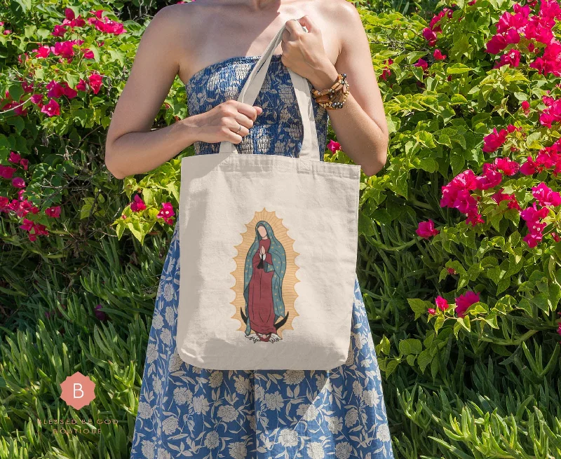 High-quality vegan leather tote bags with a sleek, cruelty-free design -Our Lady of Guadalupe Catholic Canvas Tote