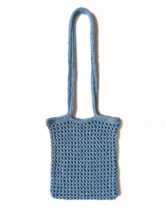 Brightly colored tote bags for a bold and energetic addition to your wardrobe -The Crochet Market Tote - Sky Blue