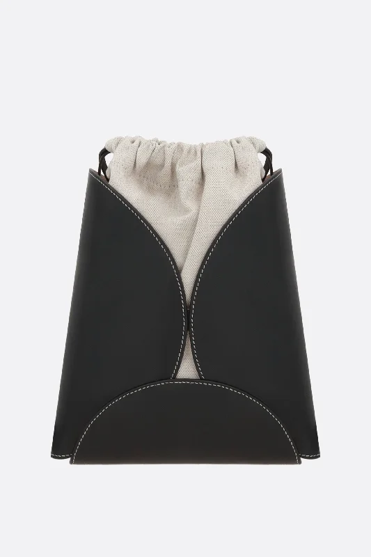 Sheer mesh crossbody bags for bold transparent trends -Curve small smooth leather and canvas bucket bag