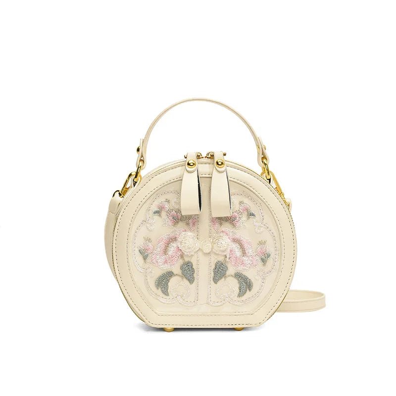 Spacious vegan crossbody bags for eco-conscious fashion lovers -Exquisite Embroidered Floral PU Leather Round Crossbody Tote